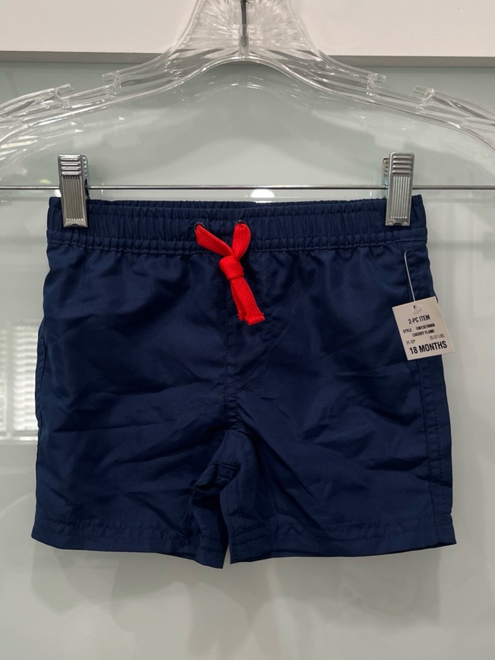 First Impressions Navy blue kids swim shorts with red drawstring, Size 18 months